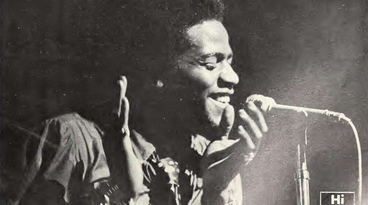Al Green singing into a microphone in a 1973 Hi Records trade advertisement, a year after Let's Stay Together topped the chart