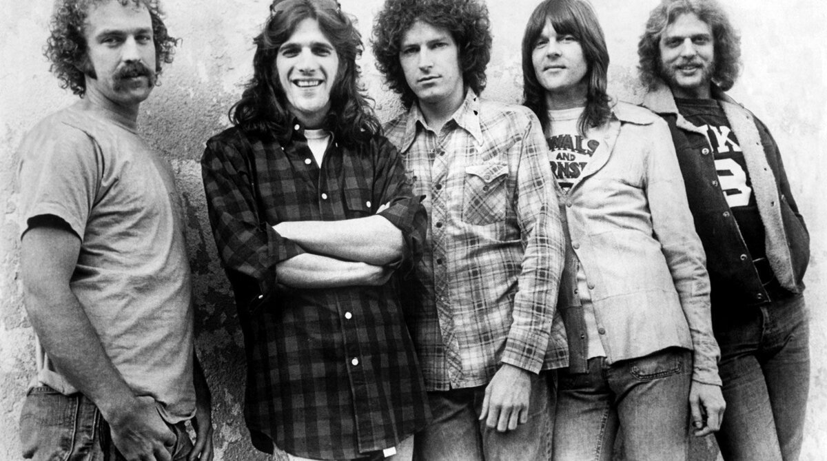 Eagles the Band in a 1974 Asylum Records press photo, showing Bernie Leadon, Glenn Frey, Don Henley, Randy Meisner, and Don Felder