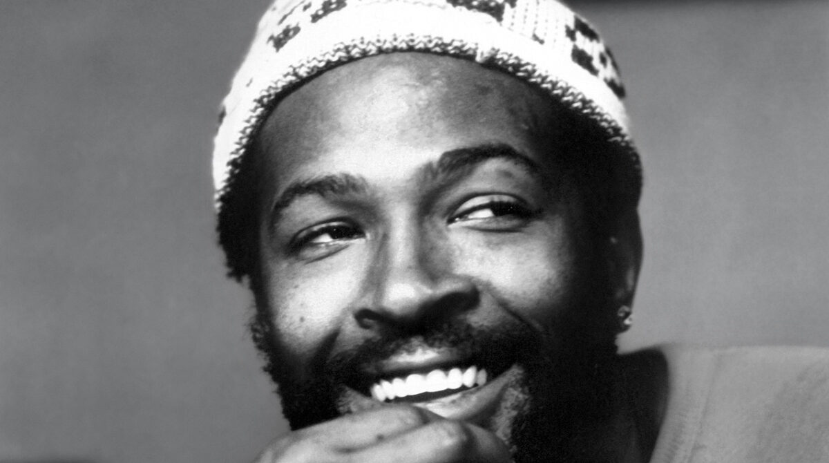 Marvin Gaye in a knit cap, smiling, in a 1973 publicity photo taken two years after What's Going On