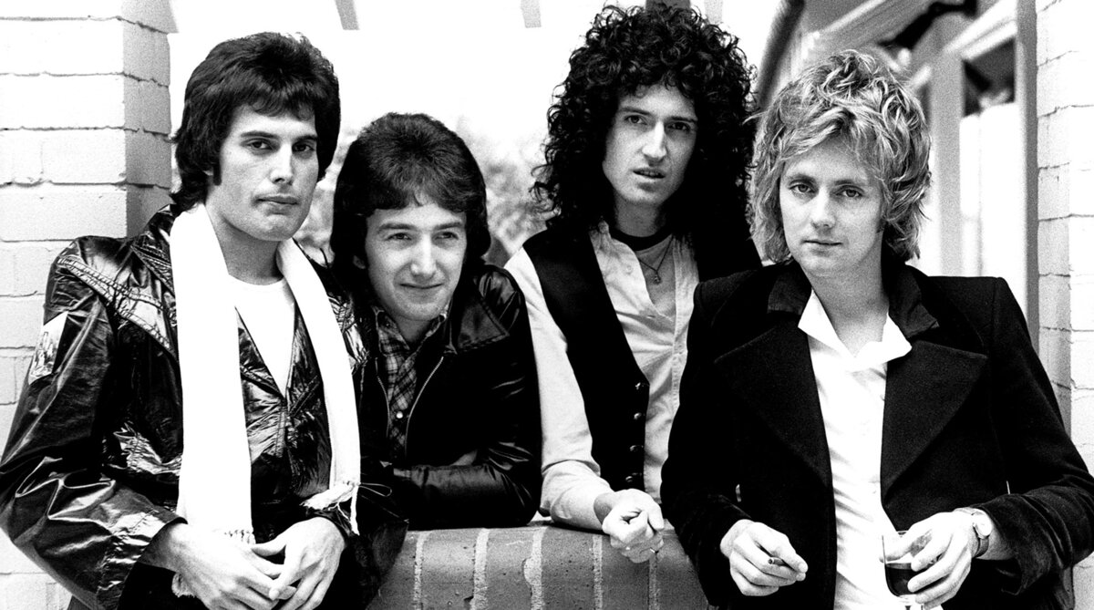 Queen Freddie Mercury, Brian May, John Deacon, and Roger Taylor in a 1977 press photo for News of the World