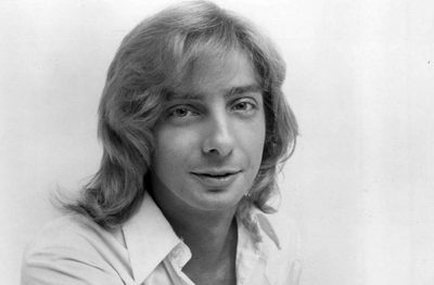 Barry Manilow in 1975, a related Artists post covering 12 of his songs