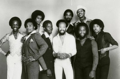 Earth, Wind and Fire in 1977, a related Artists post covering 12 of their songs