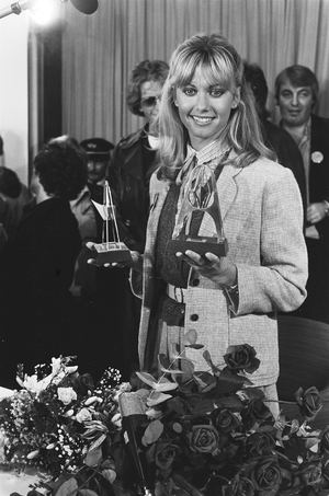 Olivia Newton-John in 1978, a related Songs post covering Hopelessly Devoted to You